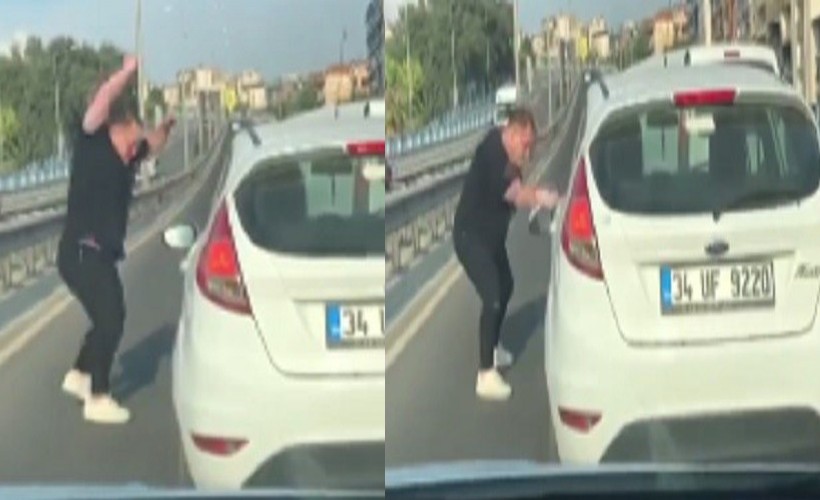 İzmir'de trafikte korku dolu anlar: Yol kesip kadın sürücünün aynasını kırdı