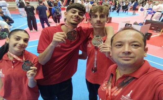 Büyükşehir'in sporcuları İzmir'e madalyalarla döndü