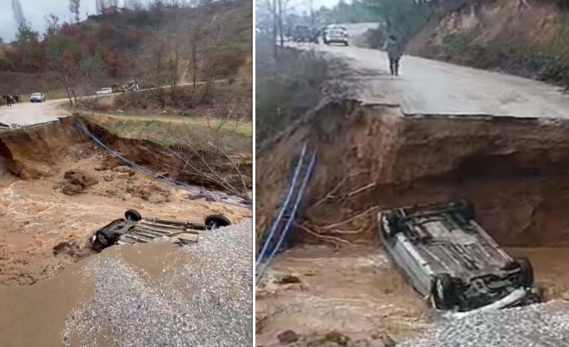 İzmir'de sürücünün zor anları: Seyir halindeki otomobil çöken yolda çukura düştü