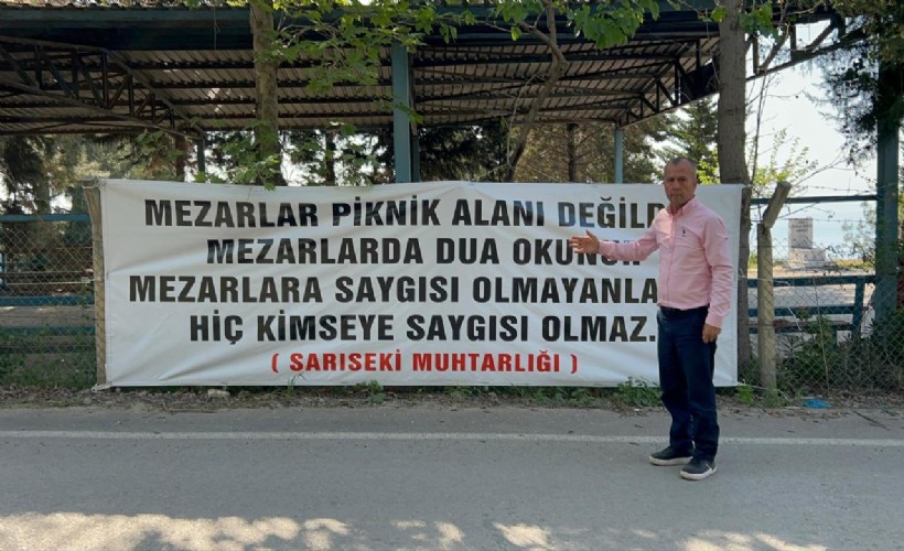 'Mezarlar piknik alanı değildir' diyen muhtar, mezarlıklarda pikniği yasakladı