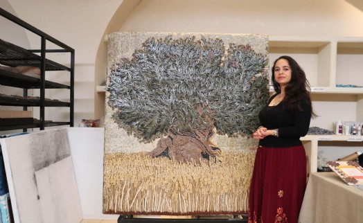 Hatay'da enkaz altından çıkarılan 500 bin parçalı mozaik sanat eseri, İzmir'de sergileniyor