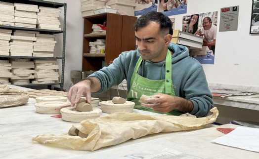 İşitme engelli Rıfat Can, hem sporda hem de sanattaki başarısıyla ilham oluyor