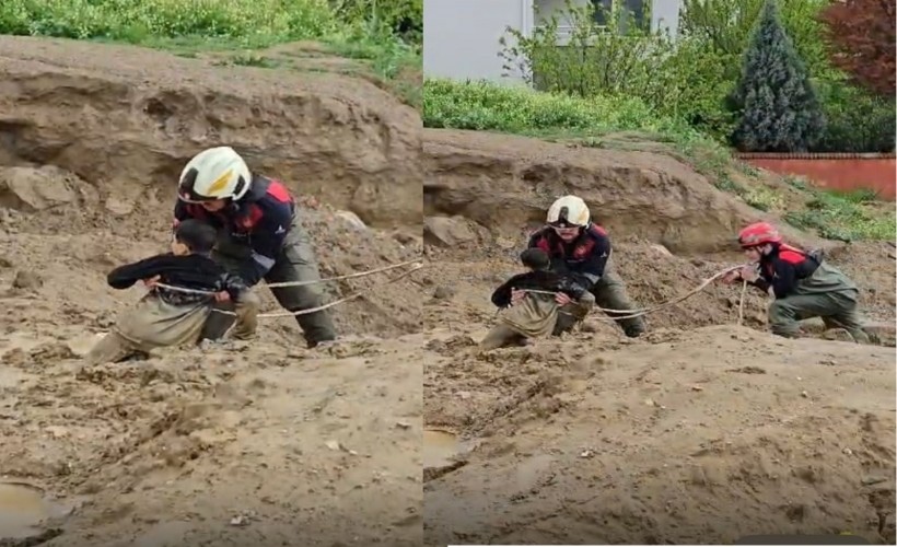 Torbalı'da çamura saplanan iki çocuğu itfaiye kurtardı