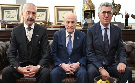 Bahçeli, Sarallar ve Şahinler aileleriyle MHP Genel Merkezi'nde bir araya geldi