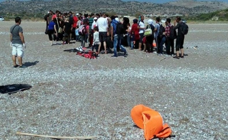 Umut yolcuları Rodos'un dünyaca ünlü plajına çıkarma yaptı