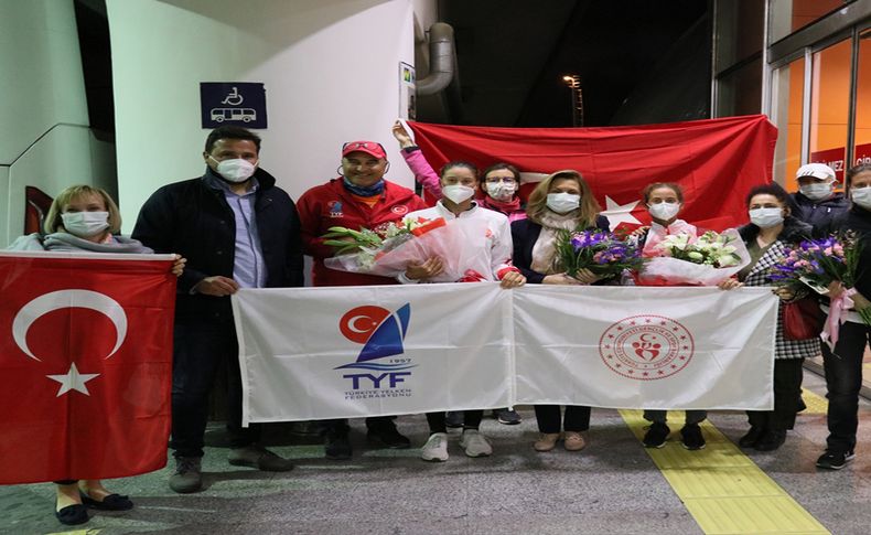 Yelkende olimpiyat kotası alan sporcular Türkiye'ye döndü