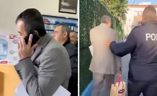 İzmir'de sandık görevlilerine AK Parti logolu kalem dağıtmak istedi