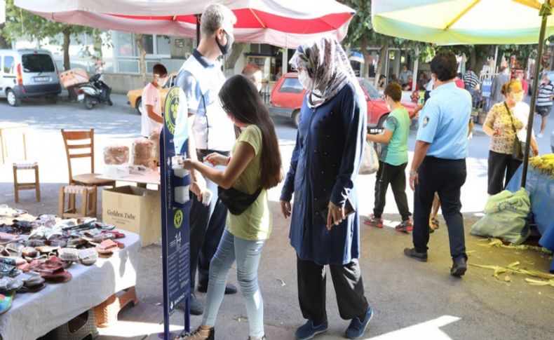 Buca pazarlarında el dezenfektanlı önlem