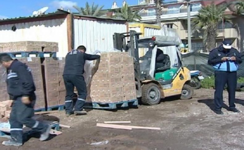 Okul sütleri boş arazide bulundu